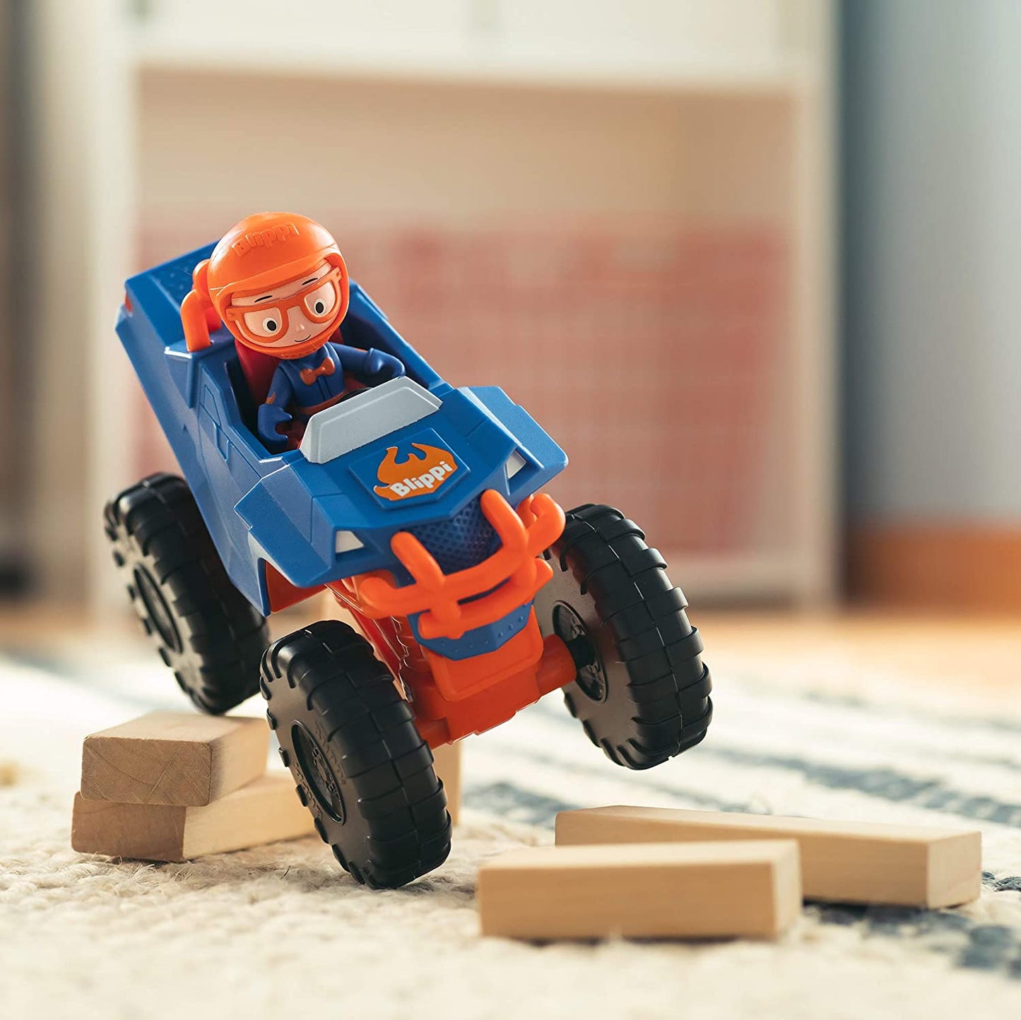 Blippi Monster Truck Mobile - Mini Vehicle with Freewheeling Features Including 2” Character Toy Figure and Cool Hydraulics